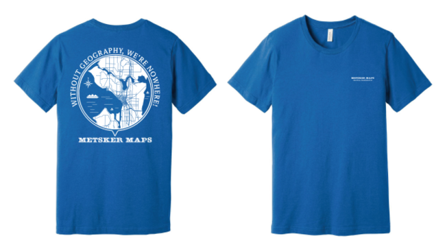 Blue t-shirt with map design on the back and logo on the front, displayed on a white background.